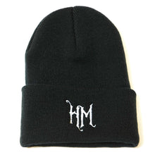 Black beanie with cuff with Haunted Museum "HM" logo embroidered on the cuff